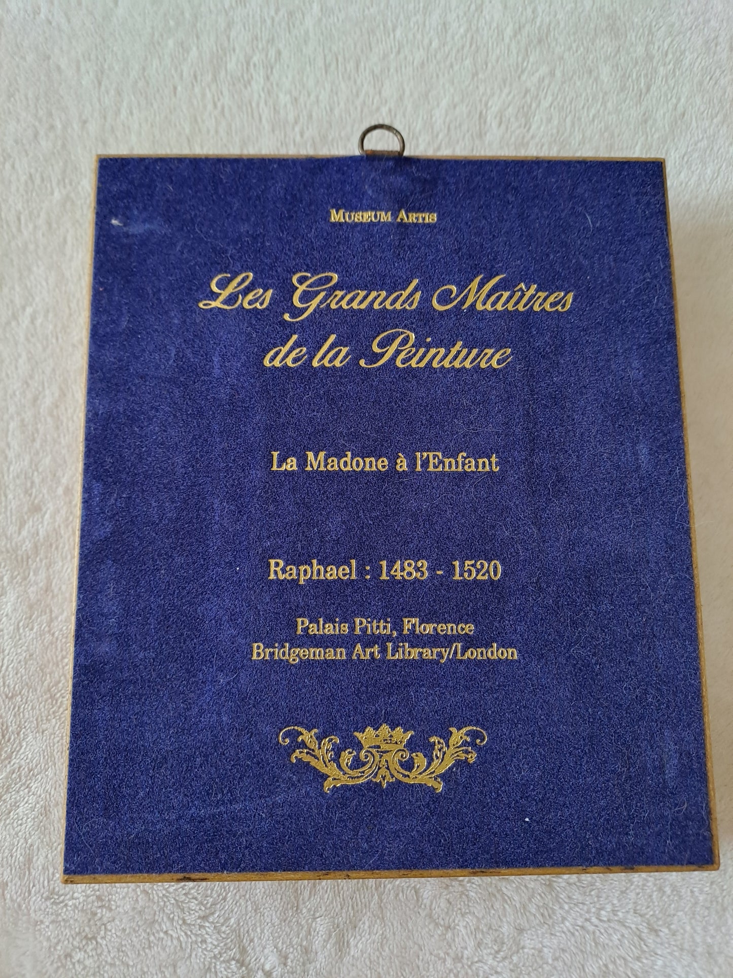Cadre / tableau. La madone à l'enfant. Raphaël : 1483 - 1520.