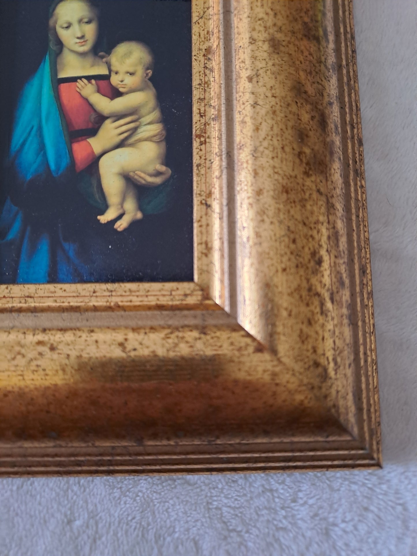 Cadre / tableau. La madone à l'enfant. Raphaël : 1483 - 1520.