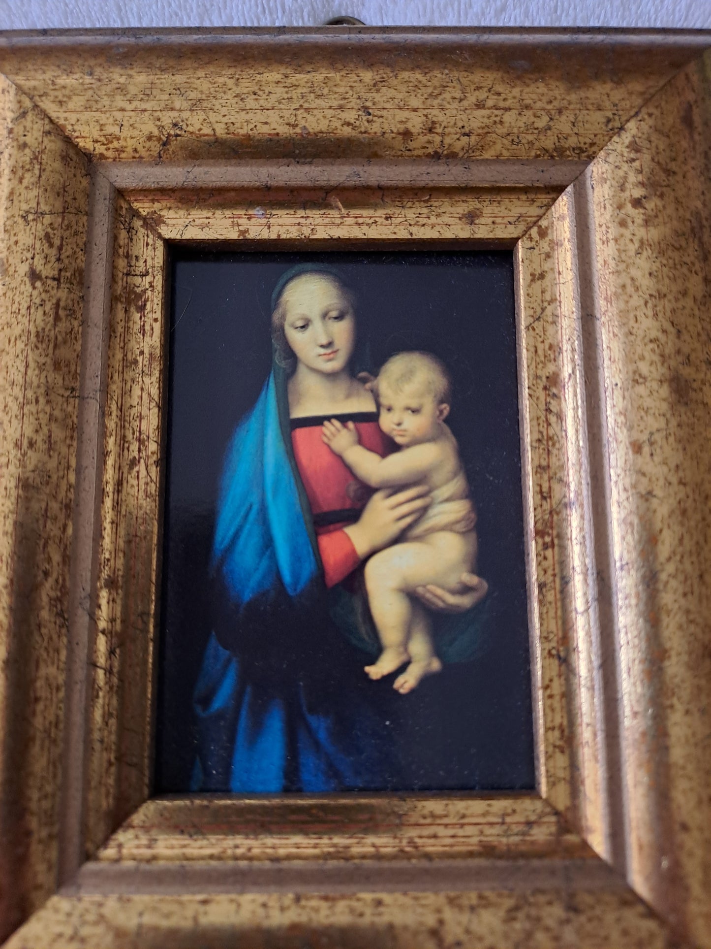 Cadre / tableau. La madone à l'enfant. Raphaël : 1483 - 1520.