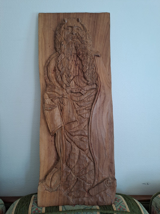 Panneau en bois représentant Moïse en bas-relief.