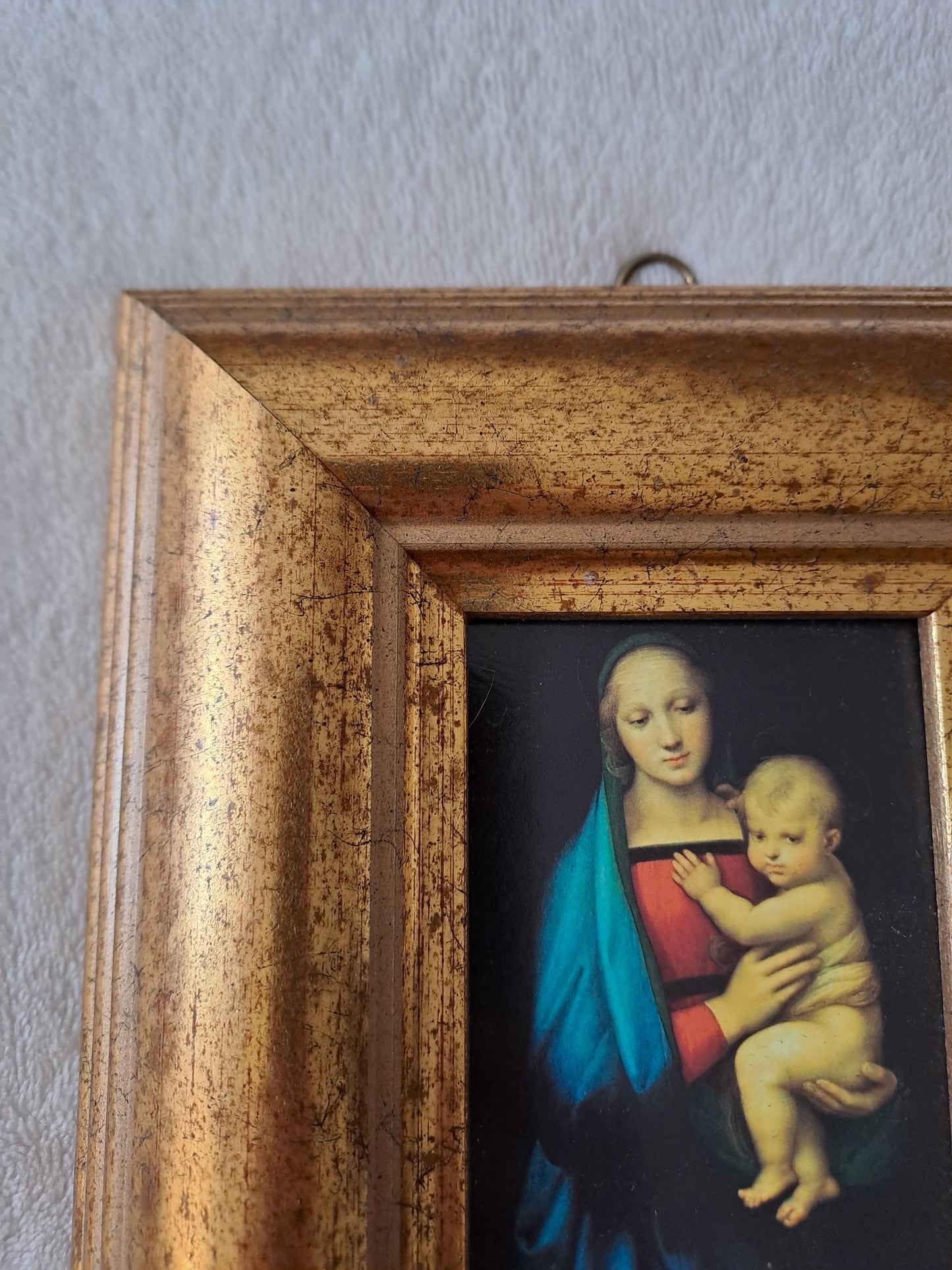 Cadre / tableau. La madone à l'enfant. Raphaël : 1483 - 1520.