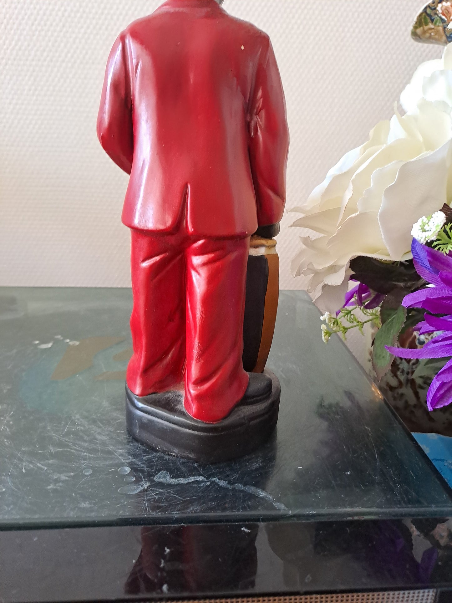 Statue en céramique. Joueur de conga.