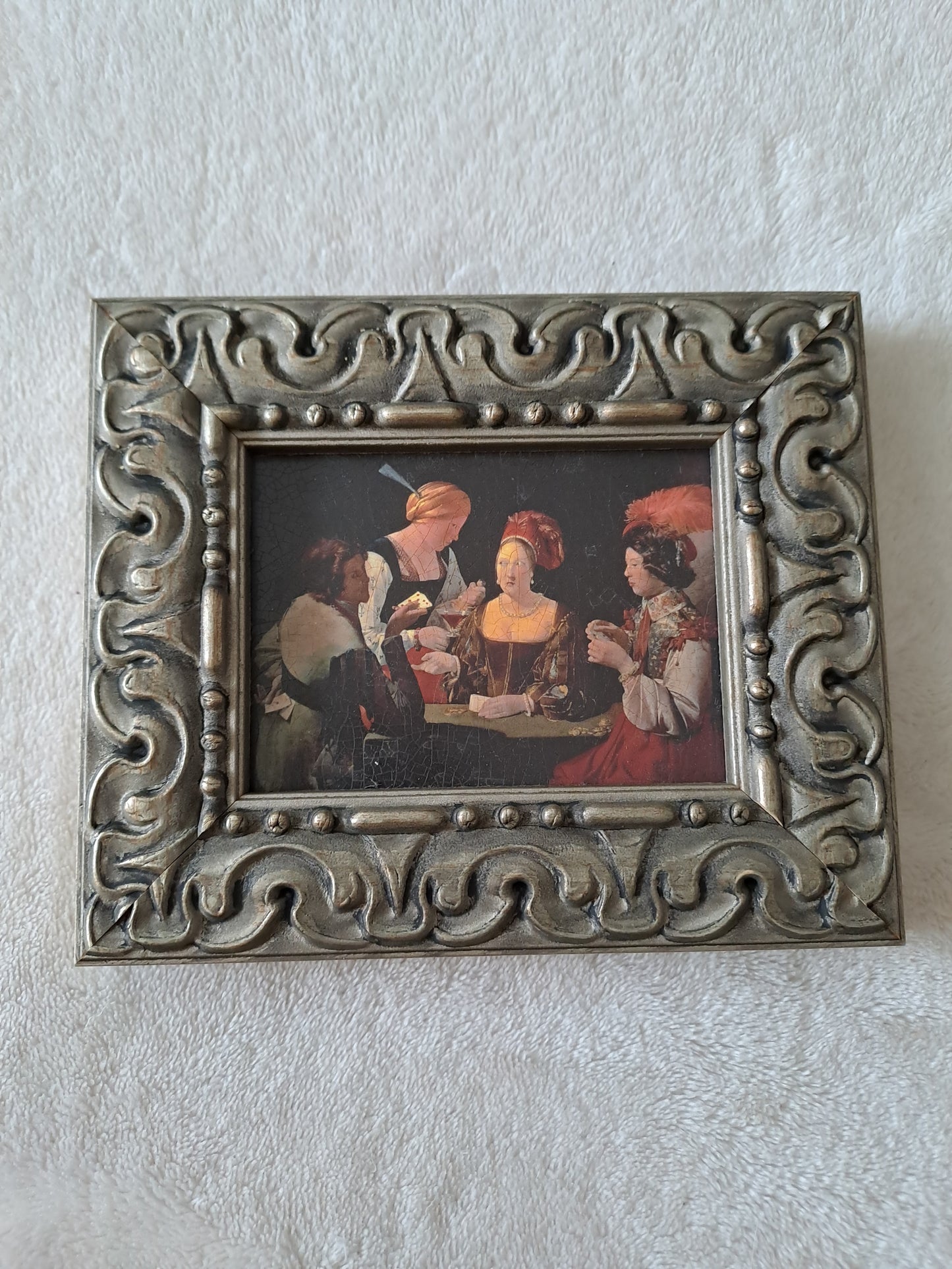 Cadre / tableau. Le tricheur. De La Tour : 1593 - 1652. Louvres, Paris.