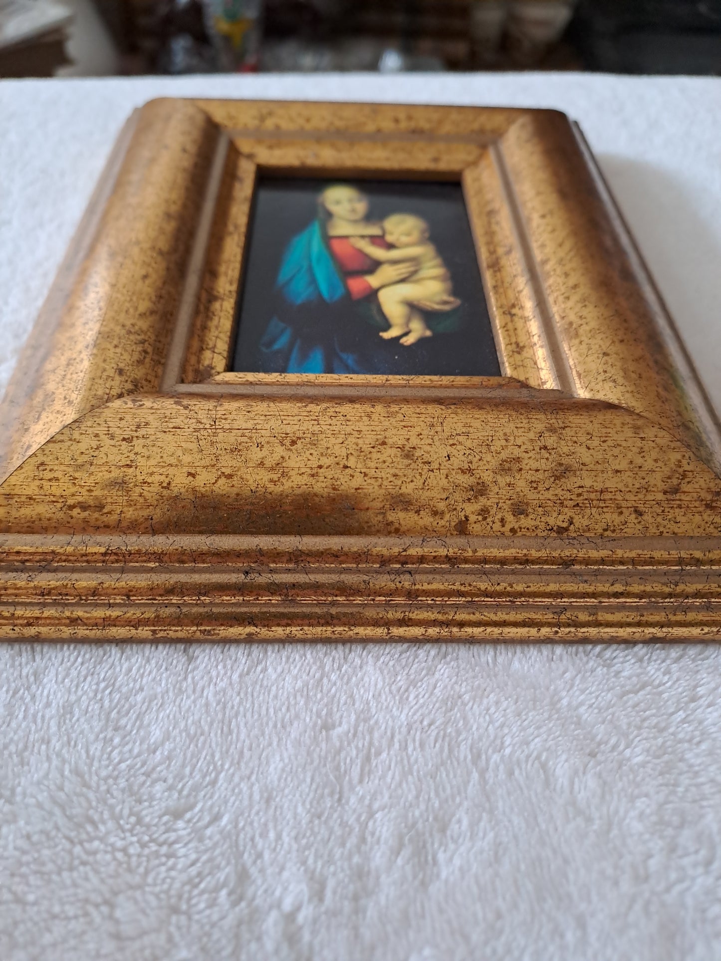 Cadre / tableau. La madone à l'enfant. Raphaël : 1483 - 1520.