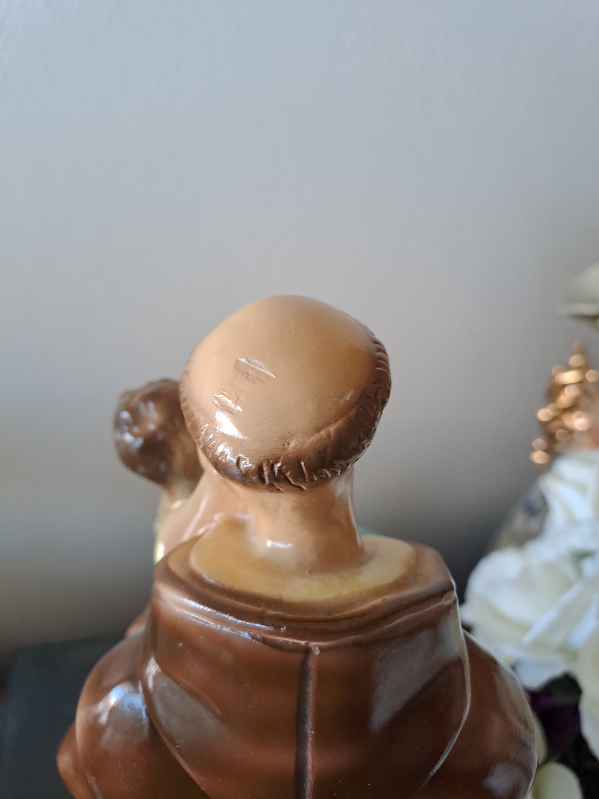 Statue Saint Antoine de Padoue signé en céramique. 41 cm.