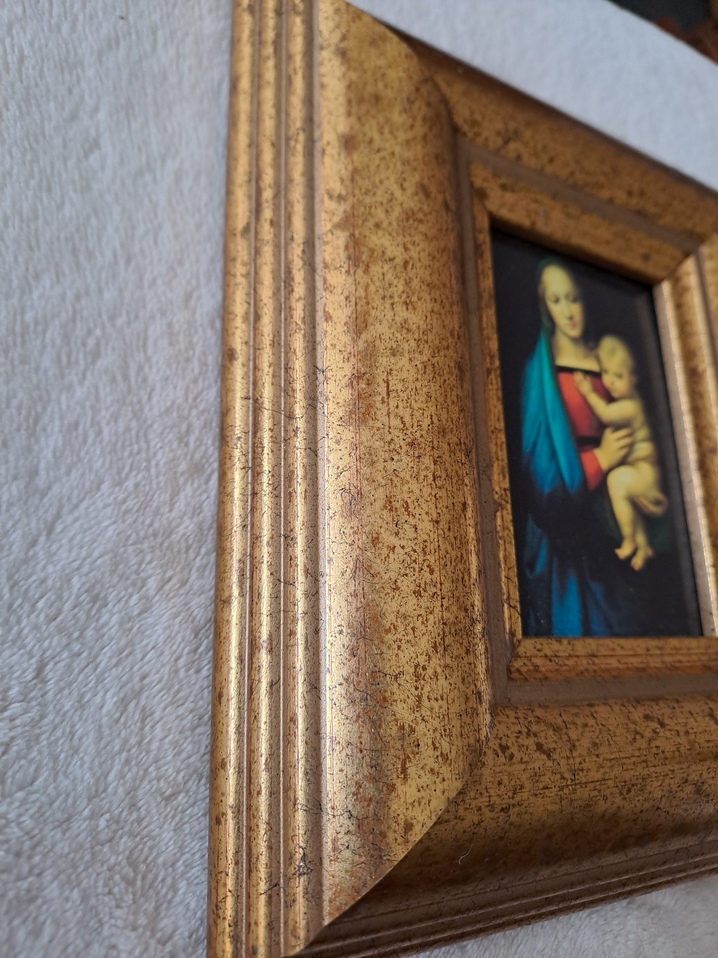 Cadre / tableau. La madone à l'enfant. Raphaël : 1483 - 1520.