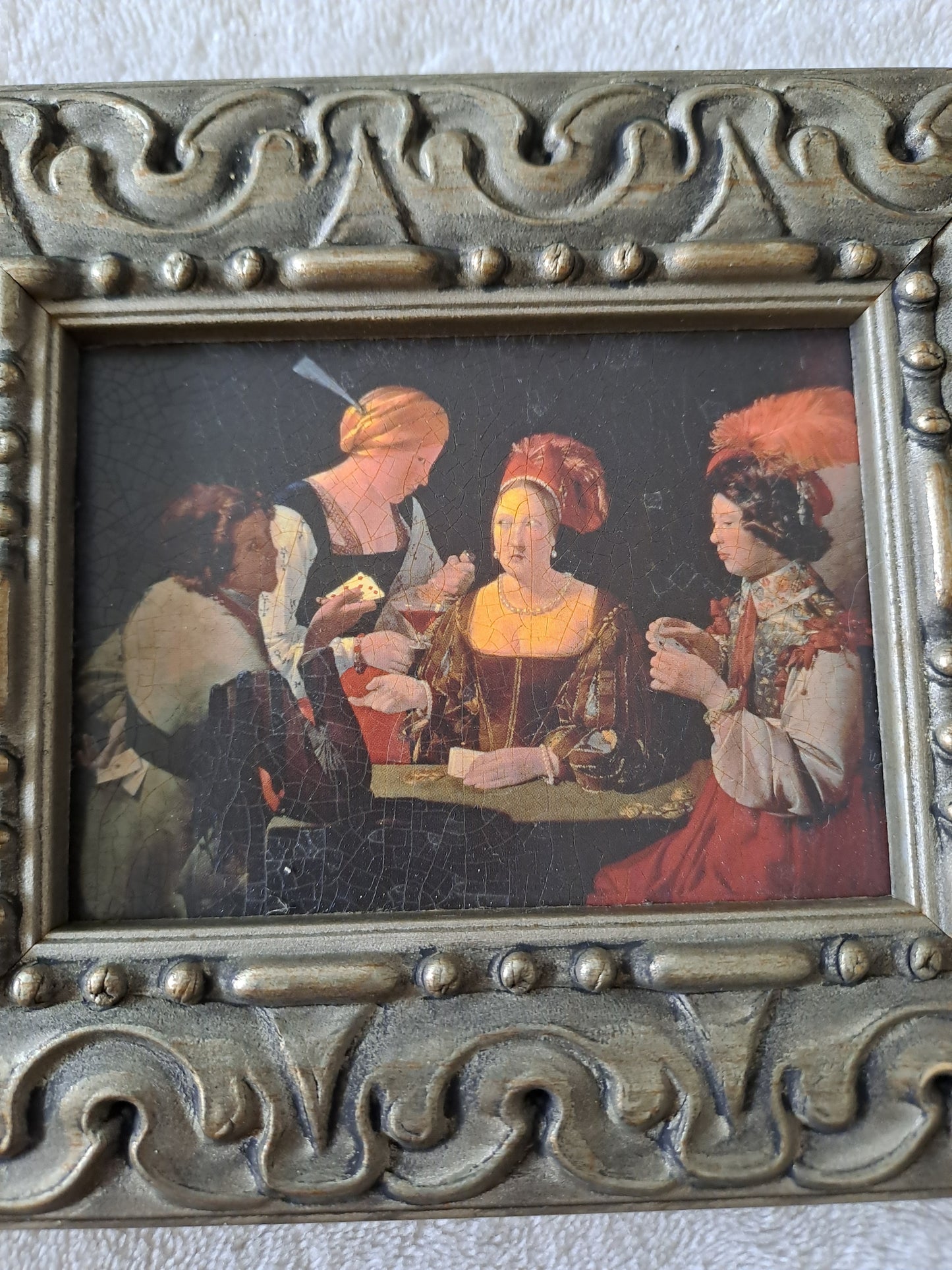 Cadre / tableau. Le tricheur. De La Tour : 1593 - 1652. Louvres, Paris.