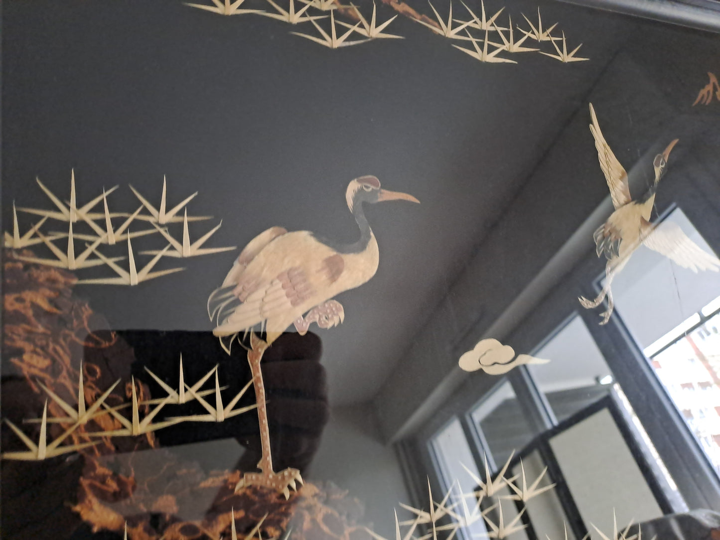 Cadre/ tableau Représentant 3 grues.