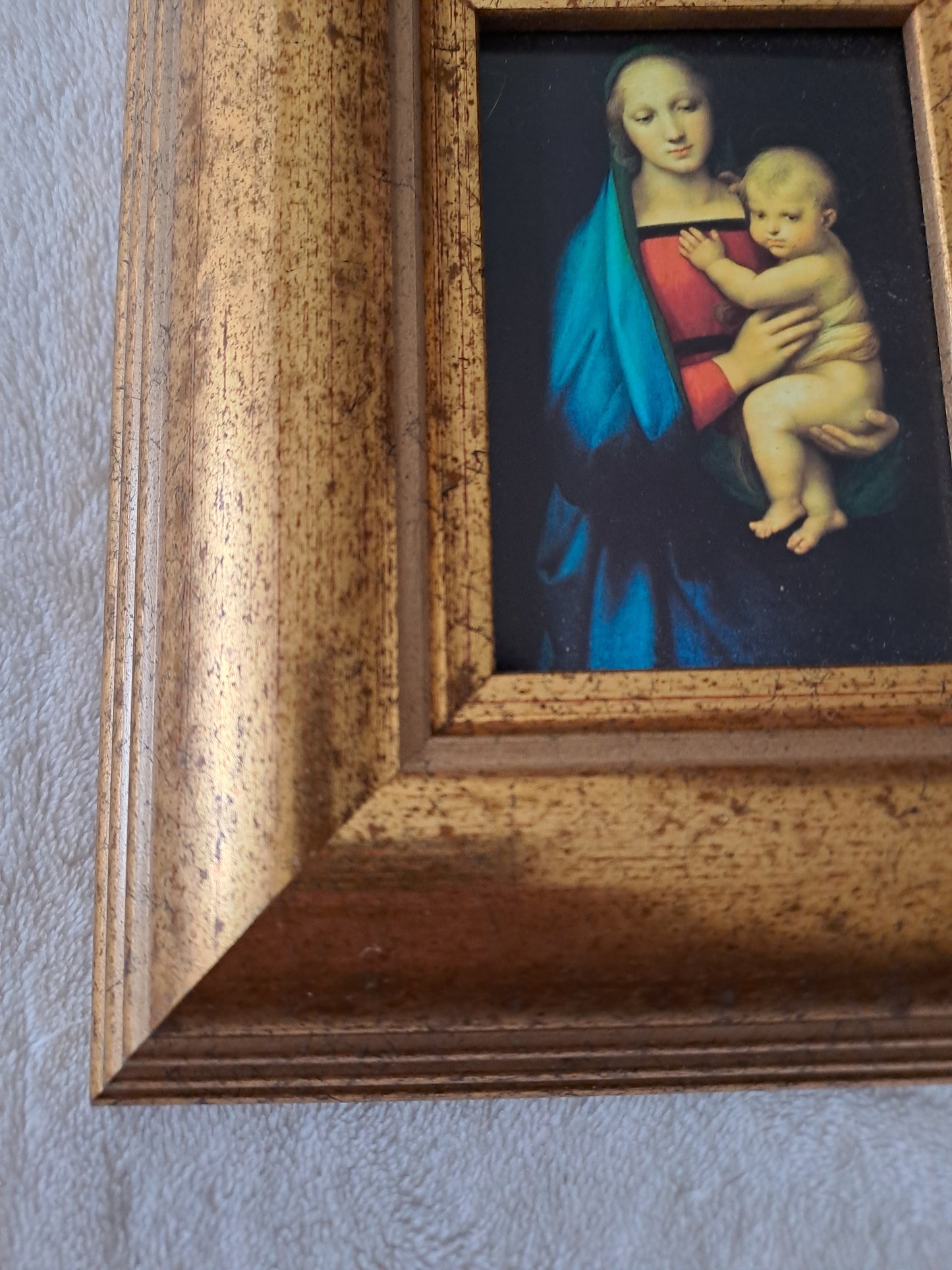 Cadre / tableau. La madone à l'enfant. Raphaël : 1483 - 1520.