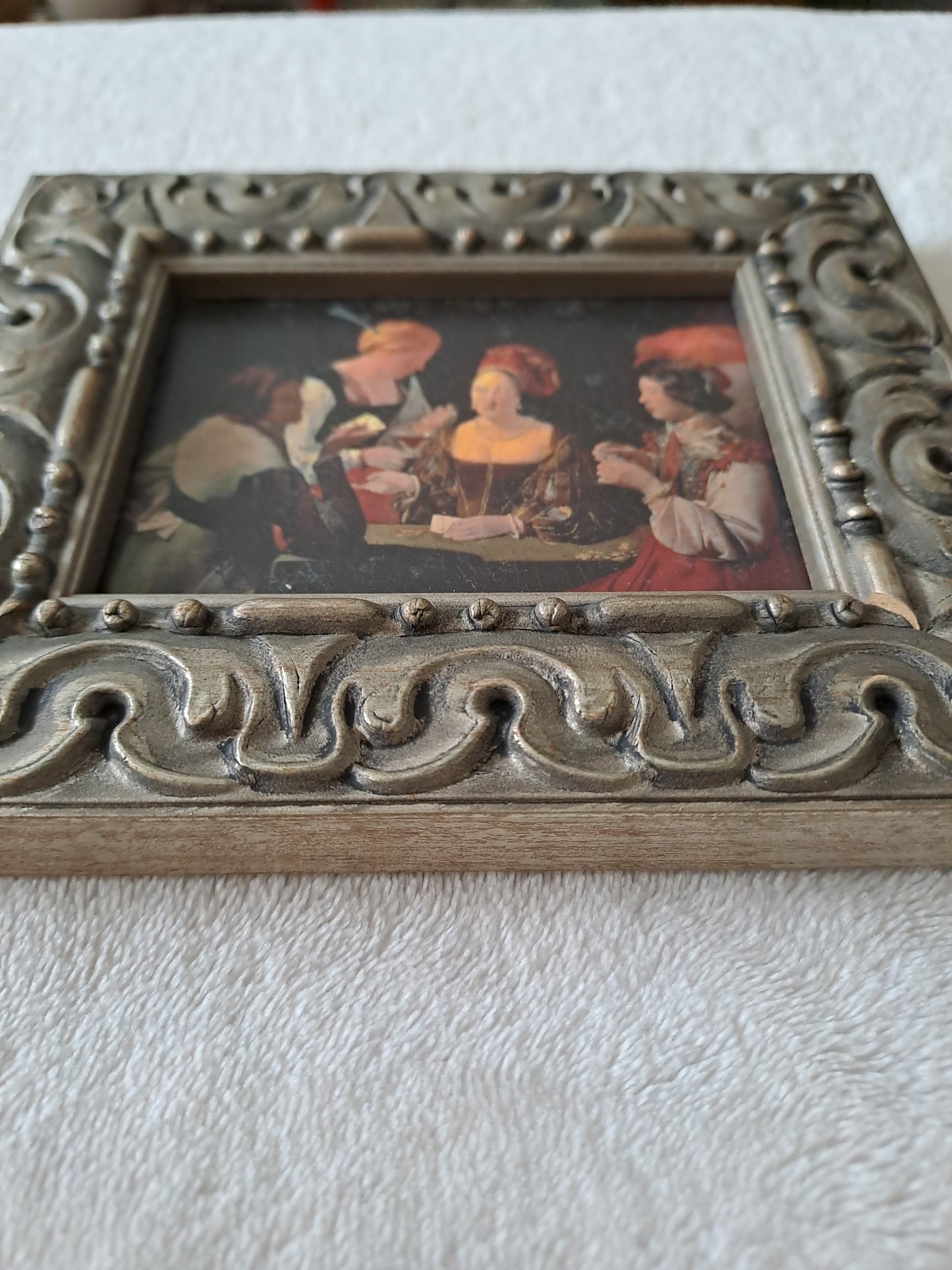 Cadre / tableau. Le tricheur. De La Tour : 1593 - 1652. Louvres, Paris.