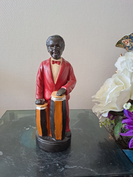 Statue en céramique. Joueur de conga.