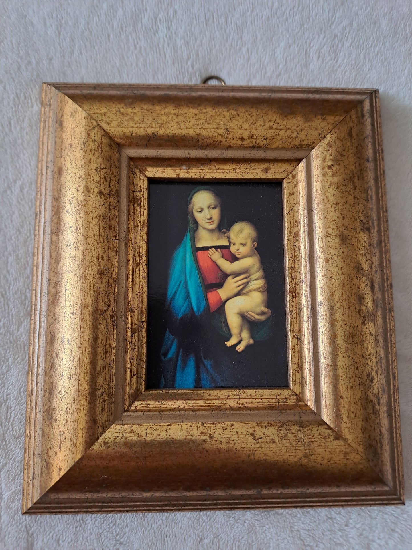 Cadre / tableau. La madone à l'enfant. Raphaël : 1483 - 1520.