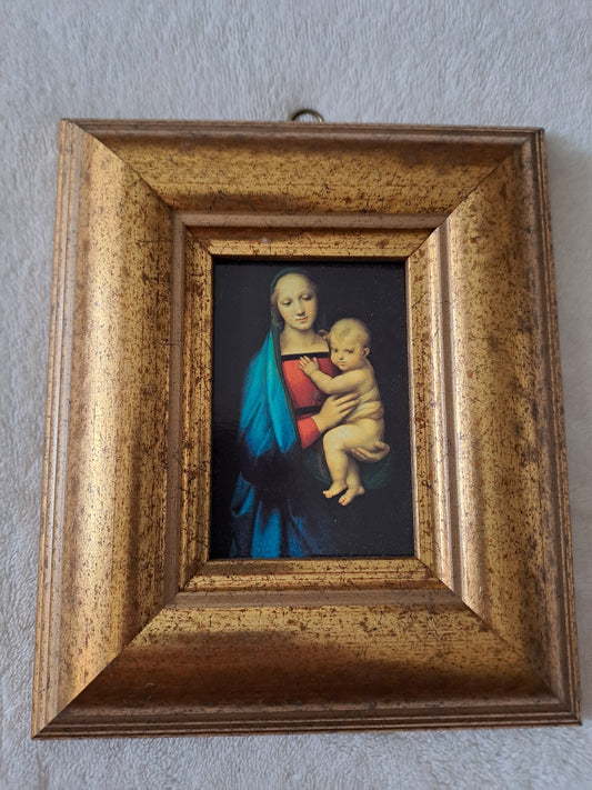Cadre / tableau. La madone à l'enfant. Raphaël : 1483 - 1520.