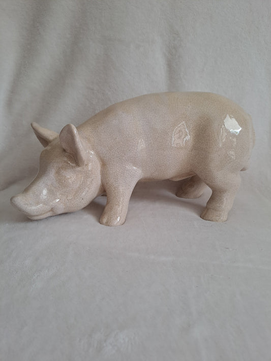 Cochon en céramique craquelée. 31 cm x 16 cm.