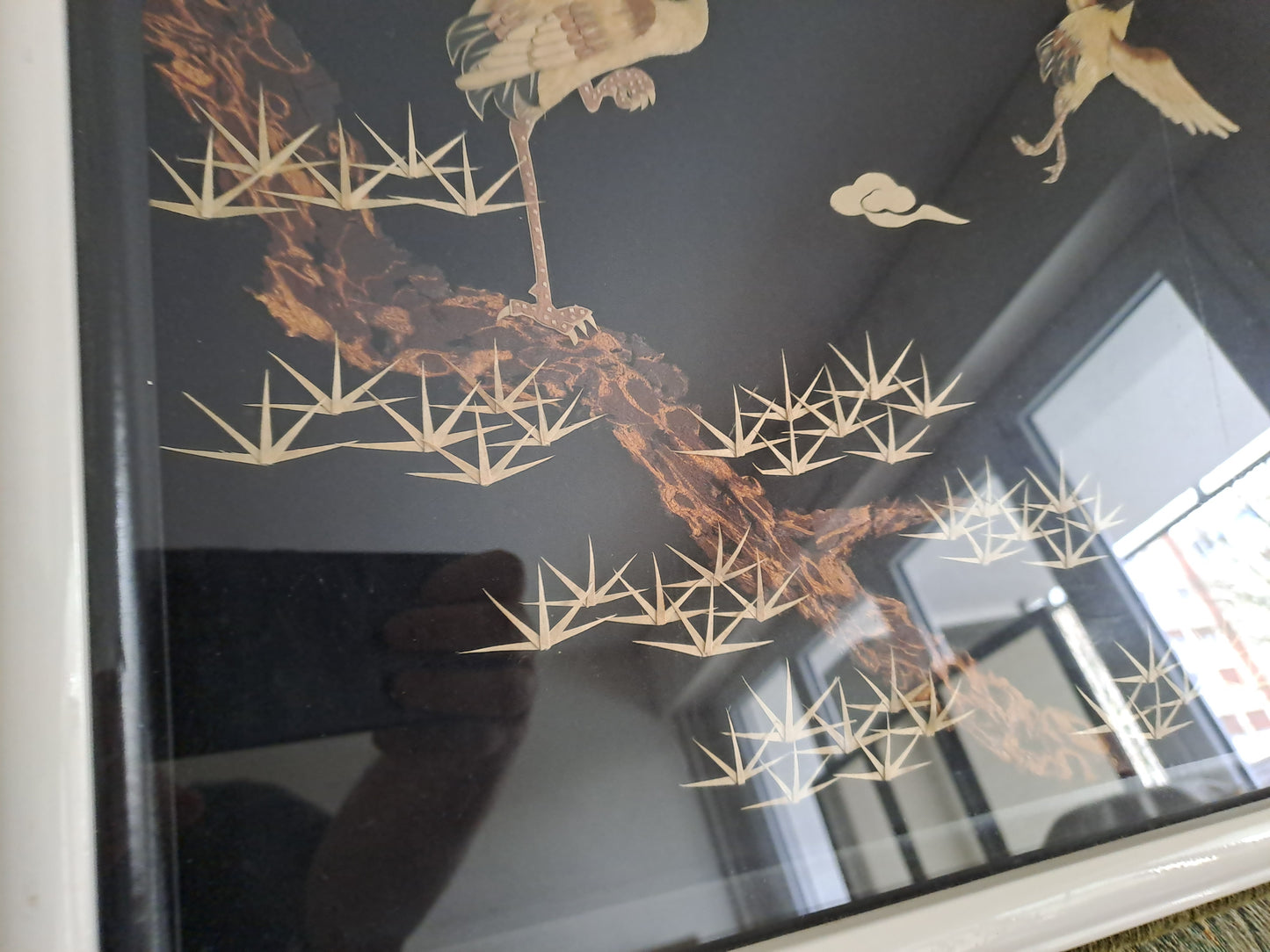 Cadre/ tableau Représentant 3 grues.