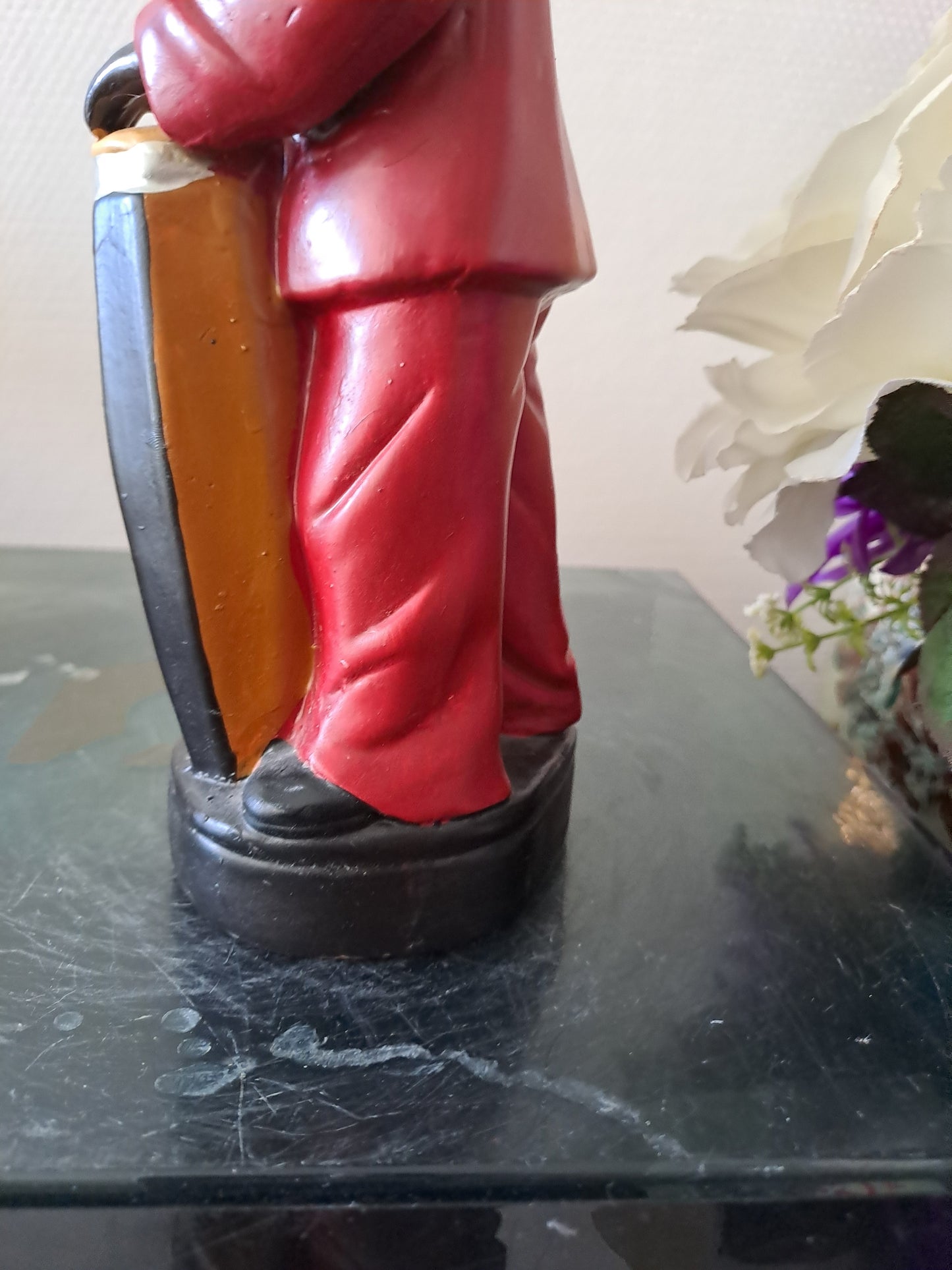 Statue en céramique. Joueur de conga.