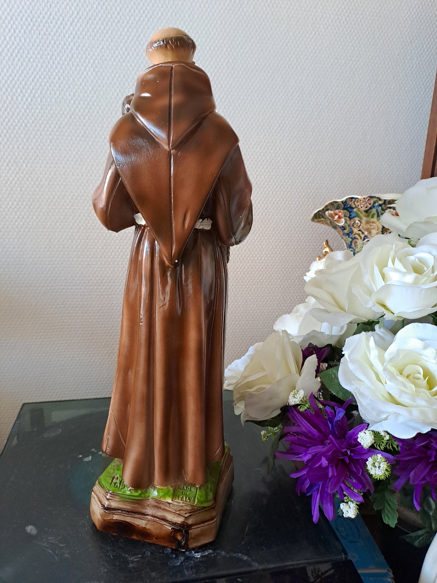 Statue Saint Antoine de Padoue signé en céramique. 41 cm.