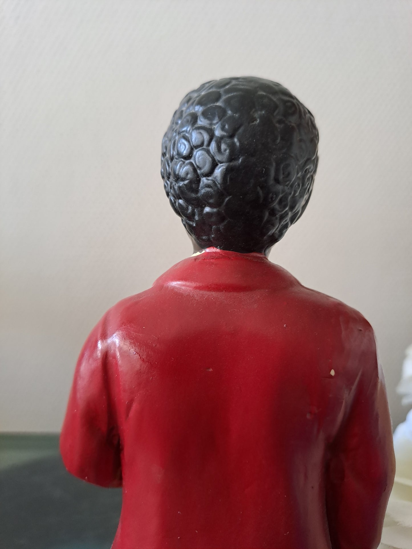 Statue en céramique. Joueur de conga.