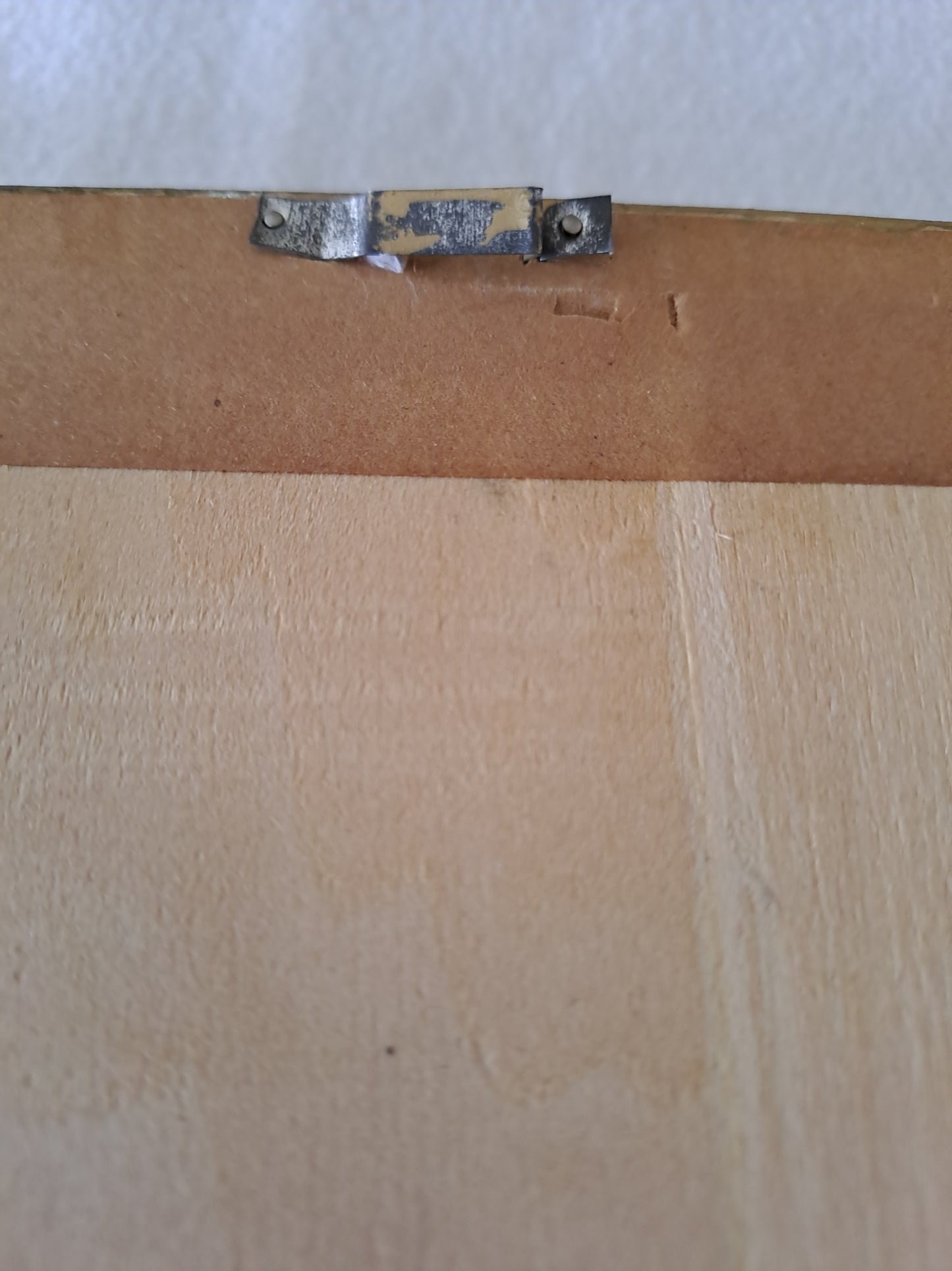 Cadre Représentant un oiseau blanc fabriqué avec de véritables plumes.